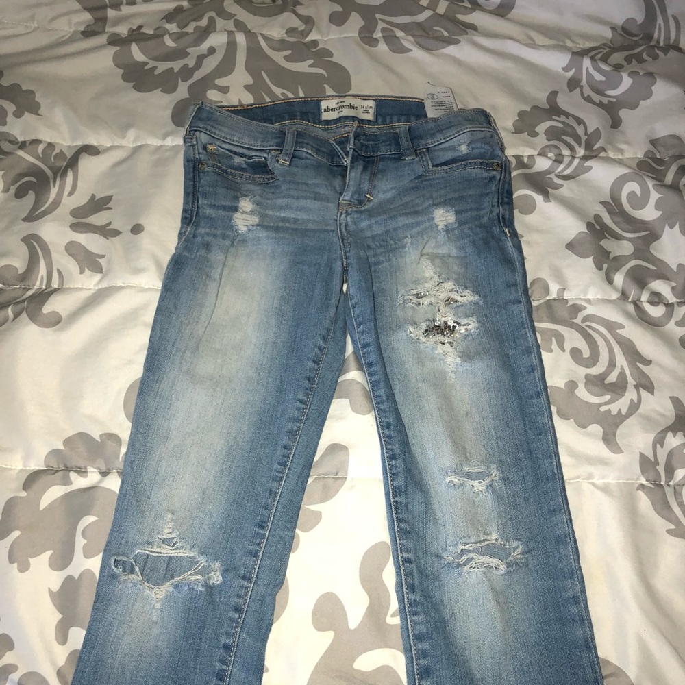 kids ripped jeans with rhinestones in the rips
